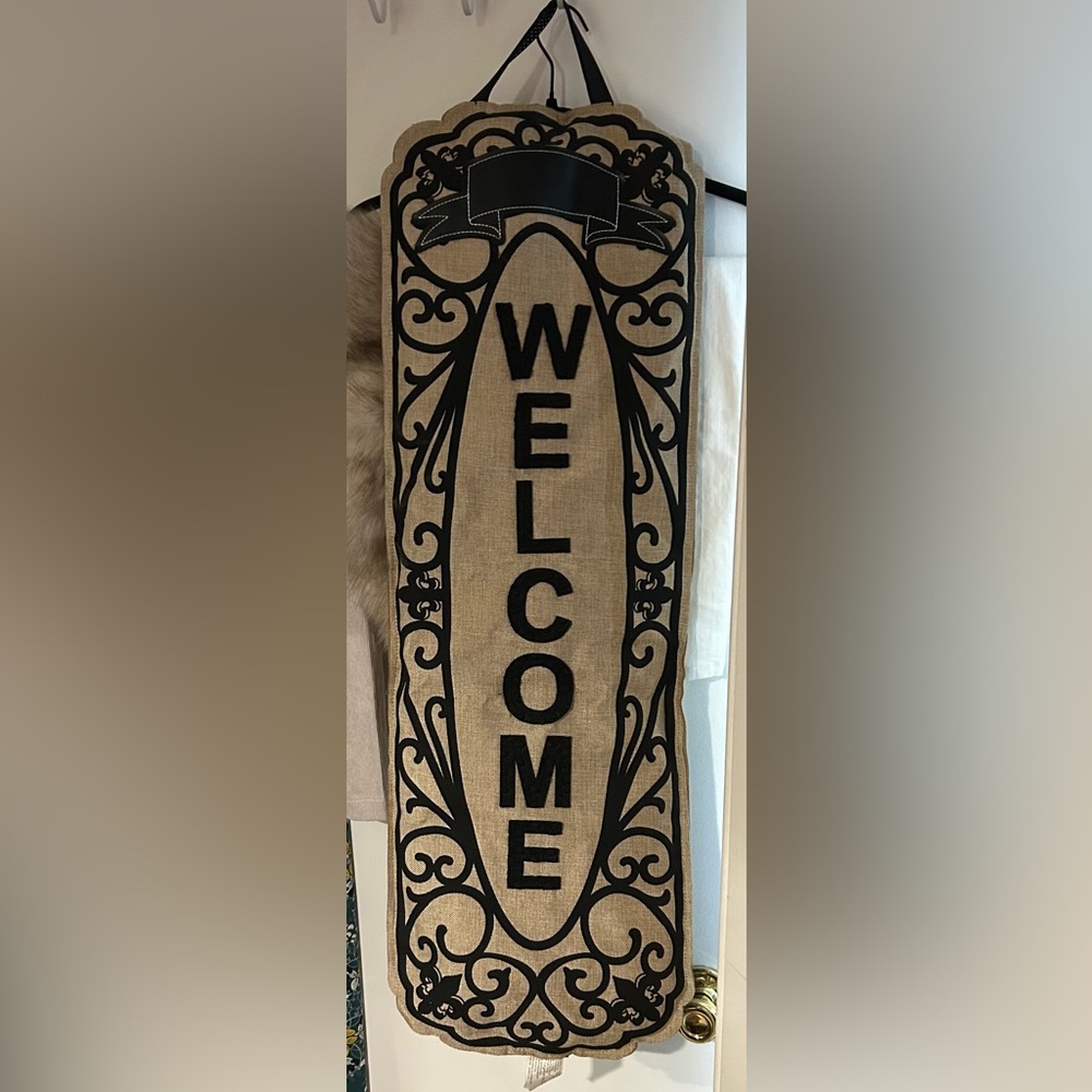 Black and Tan Welcome Sign